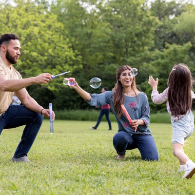 family-blowing-bubbles.jpg