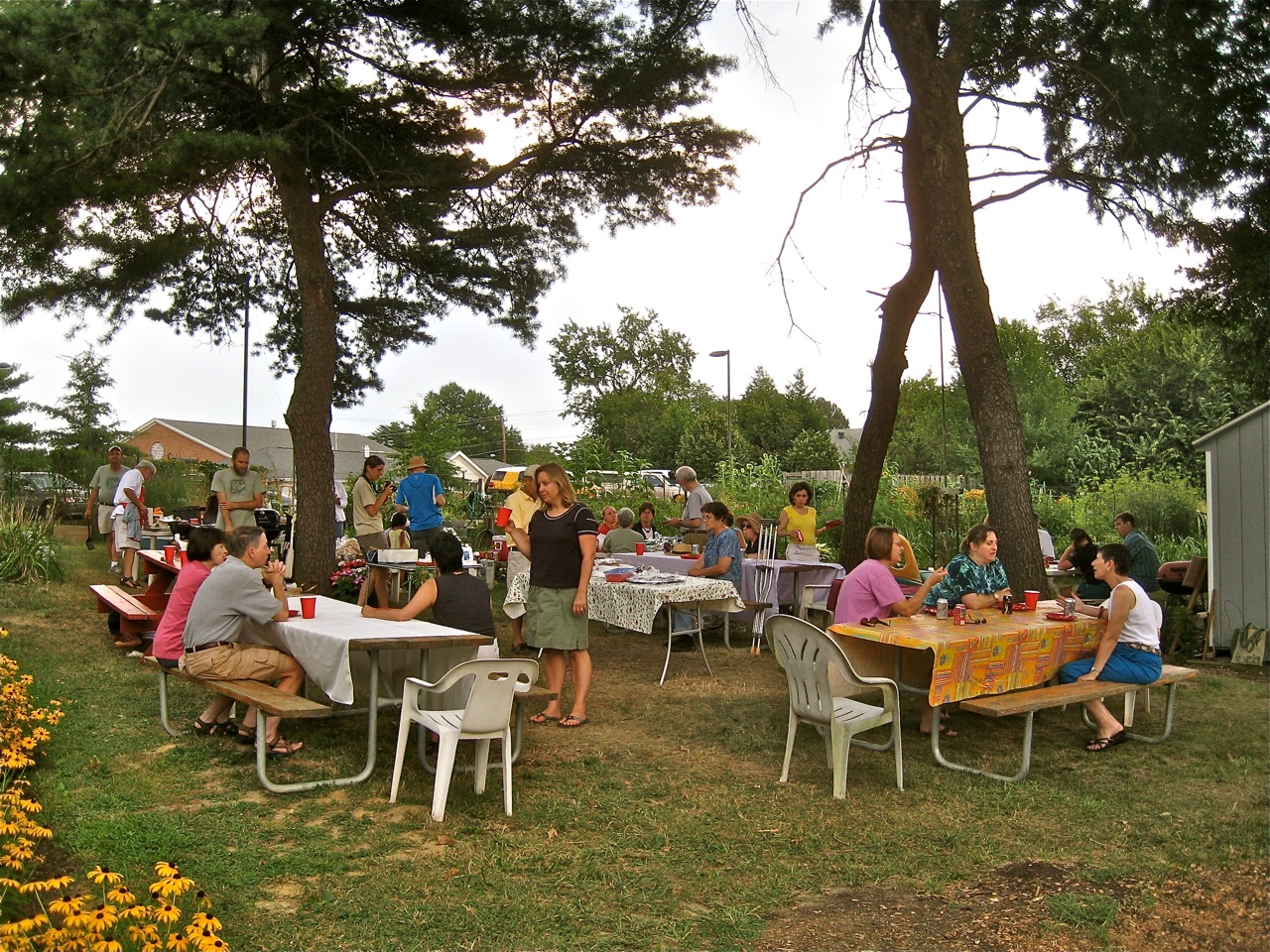 Residents socializing at a community garden function