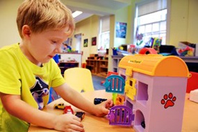 Kid playing with Toys