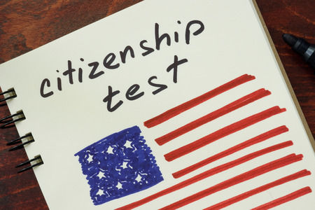 Paper with Citizenship test and American flag