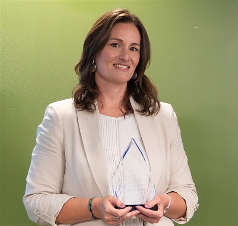 Heather Williams holding the Nurse of the Year Award